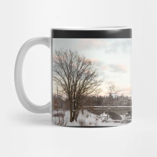 A snowy winter landscape Mug